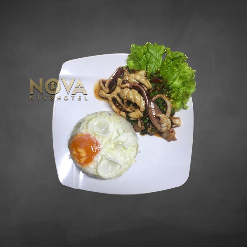 Stir-fried squid with holy basil and rice served