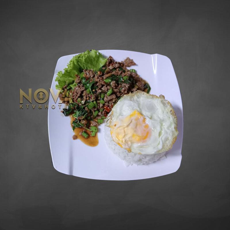 Stir-fried beef with holy basil and rice served